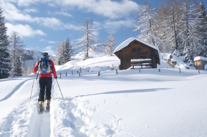 Ski touring across snow-covered mountains